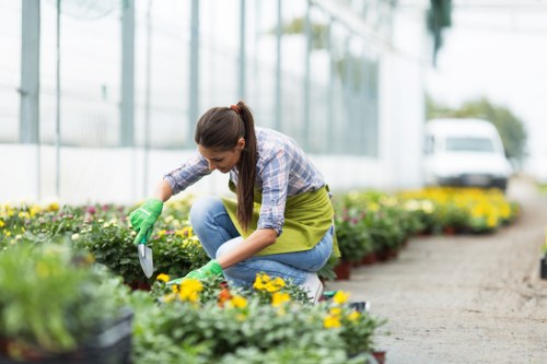 Landscapers sorting green waste for recycling in Aldgate